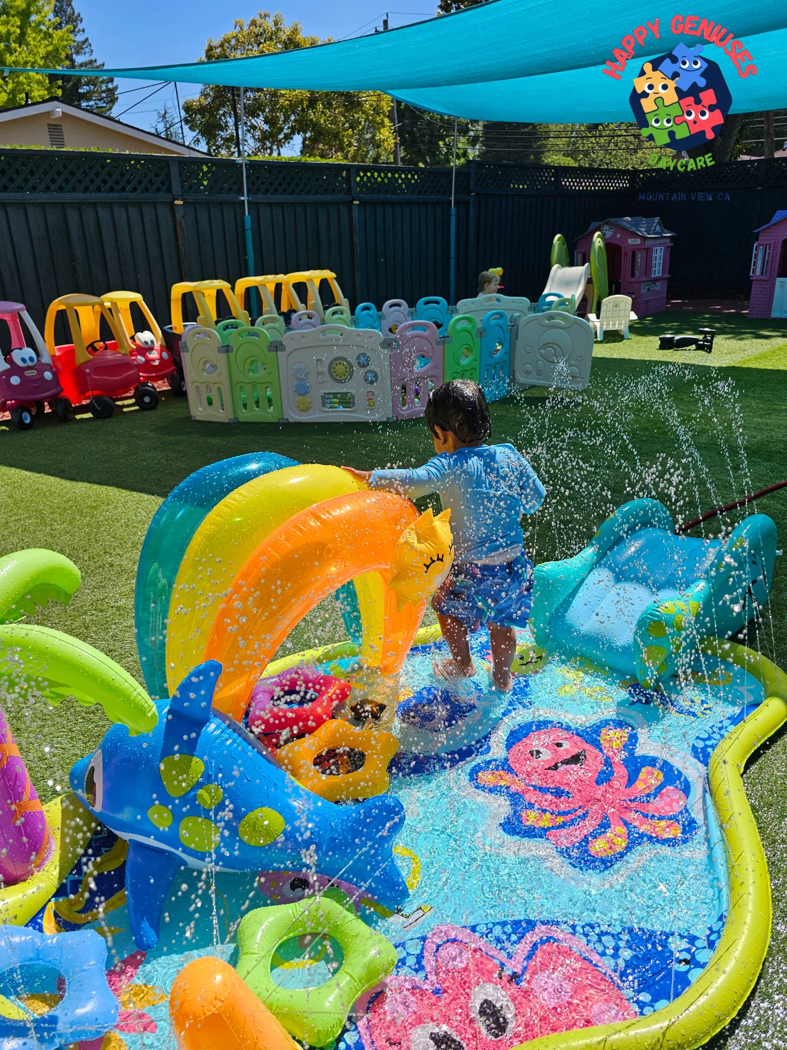 Water play in the Happy Geniuses outdoor space